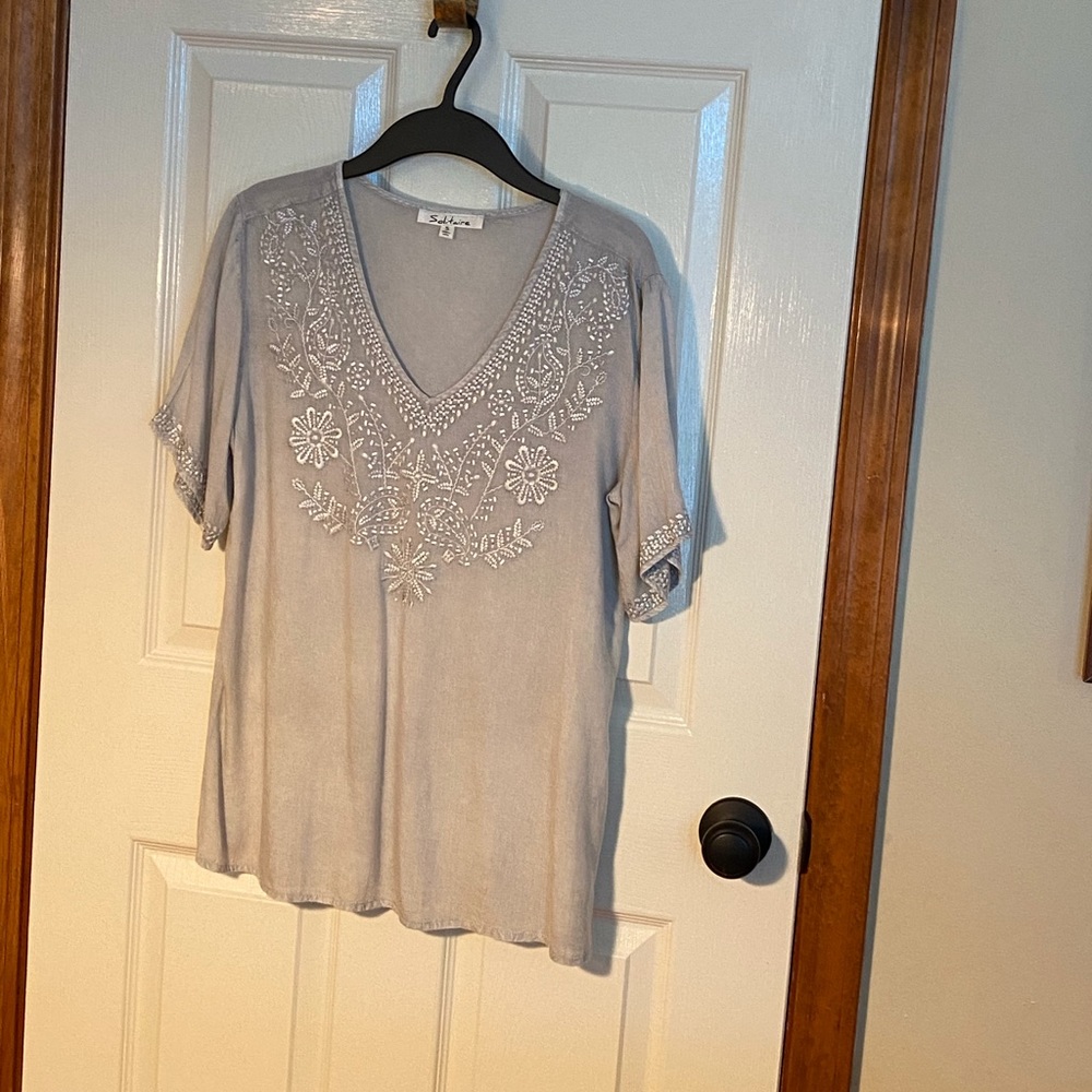 Light gray short sleeved top. NWOT